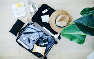 Reisevorbereitung Kofferpacken mit Checkliste