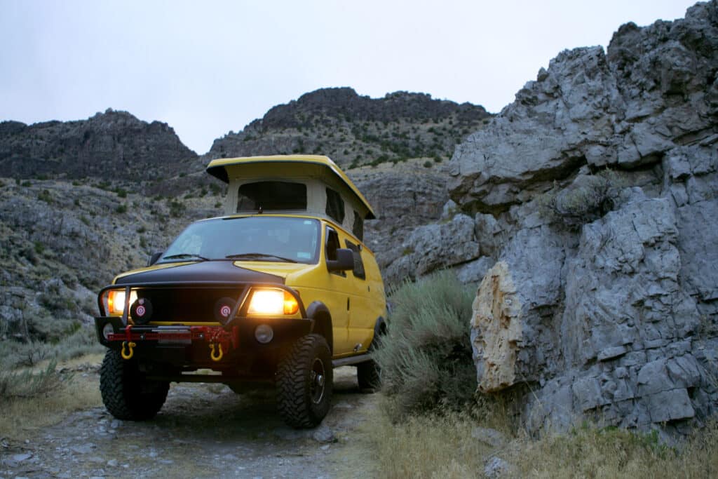 Camping with Yellow RV Van in Kings Canyon, Utah