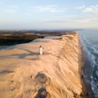 Aerial Drone View of Rubjerg Knude Lighthouse in Denmark